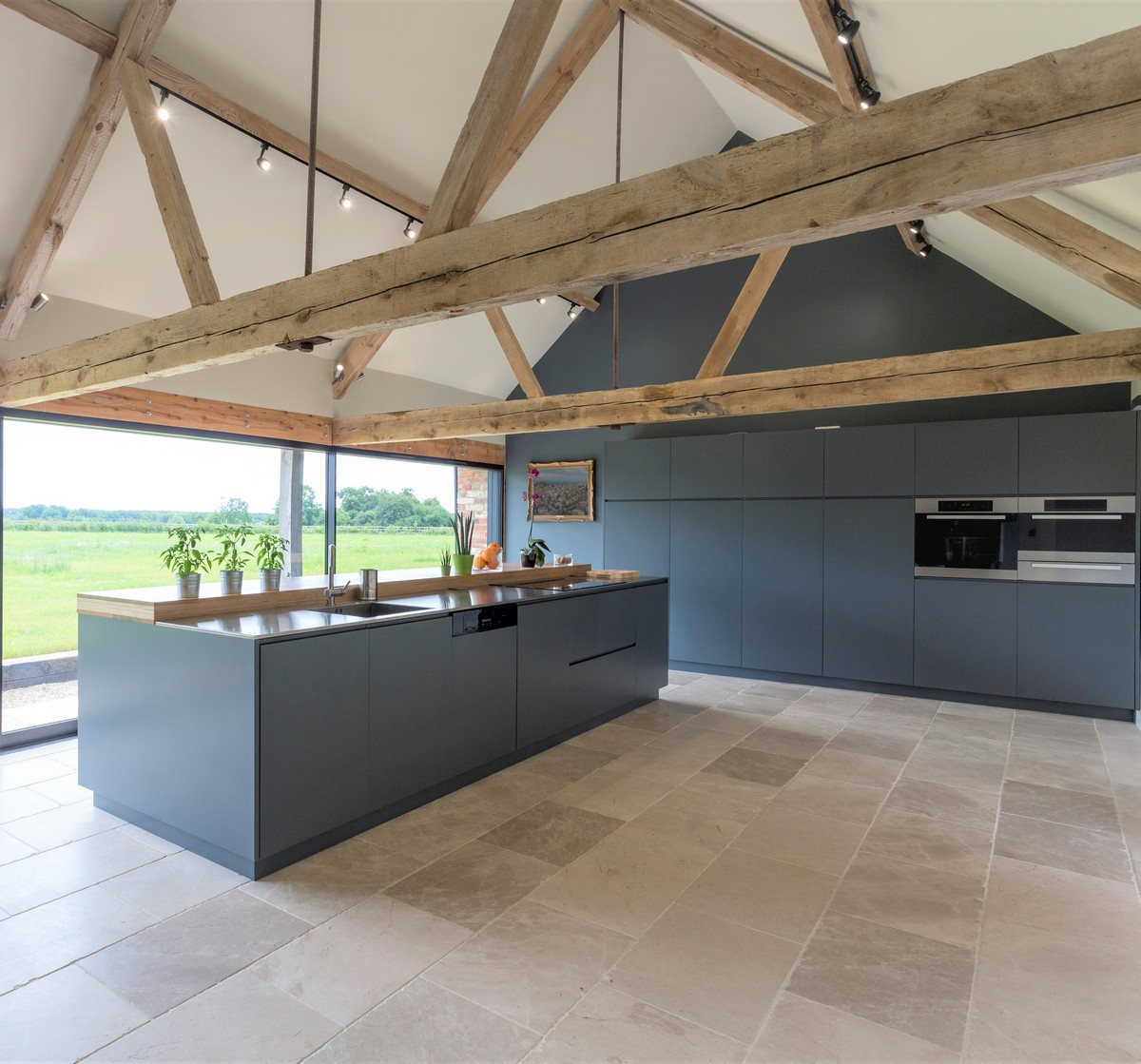 Breakfast bar and glass wall in modern kitchen